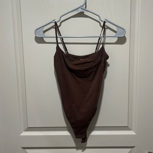 Skims body suit